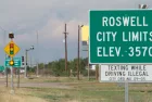 Highway sign for Roswell^ New Mexico