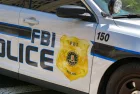 Close up view of the badge on the side of a police patrol car used by the FBI. Washington DC^ USA - 30 April 2024