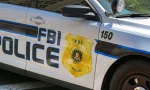 Close up view of the badge on the side of a police patrol car used by the FBI. Washington DC^ USA - 30 April 2024