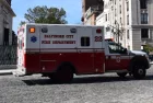 Baltimore City Fire Department ambulance driving through Mount Vernon