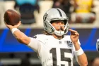 Las Vegas Raiders quarterback Gardner Minshew II #15 pass the ball against the Los Angeles Rams in an NFL football game at SoFi Stadium^ Oct. 20^ 2024^ in Inglewood^ Calif.