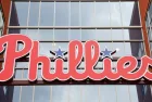 A sign for the MLB Philadelphia Phillies. Philadelphia^ Pennsylvania - April 6^ 2024