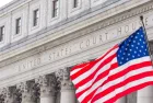 USA national flag waving in the wind in front of United States Court House in New York