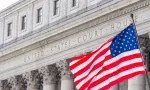 USA national flag waving in the wind in front of United States Court House in New York