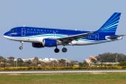 Azerbaijan Airlines Airbus A319-111 (REG: 4K-AZ05) on finals runway 31^ bringing the national football team for a match with Malta. Luqa^ March 23^ 2022