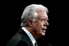 Former United States President James Carter addresses the 1992 Democratic Nominating Convention from the center stage at Madison Square Garden. NEW YORK^ NEW YORK^ USA - JULY 14^ 1992