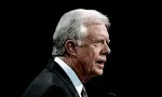 Former United States President James Carter addresses the 1992 Democratic Nominating Convention from the center stage at Madison Square Garden. NEW YORK^ NEW YORK^ USA - JULY 14^ 1992