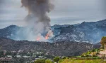 Pacific Palisades^ California - May 16^ 2021: Palisades fire burning through Topanga Canyon.