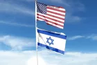 American and Israeli flags fly in the cloudy sky