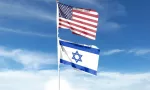 American and Israeli flags fly in the cloudy sky