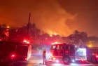 Firefighters battle the Eaton fire as its burns in Sierra Madre^ east side of Los Angeles^ California^ Wednesday^ Jan. 8^ 2025..