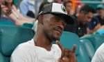 Jimmy Butler^ an American professional basketball player for the Miami Heat^ attends the semifinal match at 2023 Miami Open at the Hard Rock Stadium in Miami MIAMI GARDENS^ FLORIDA - MARCH 31^ 2023