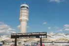 Control Tower^ National Airport seen from Metro Station platform. Ronald Reagan National Airport^ aka DCA^ is actually in Arlington^ three miles from DC. ARLINGTON^ VIRGINIA - OCT. 12^ 2017