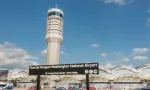 Control Tower^ National Airport seen from Metro Station platform. Ronald Reagan National Airport^ aka DCA^ is actually in Arlington^ three miles from DC. ARLINGTON^ VIRGINIA - OCT. 12^ 2017