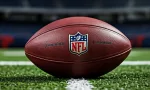 Outdoor photo of NFL football in the middle of the field
