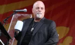 Billy Joel performs on state at the 2013 New Orleans Jazz and Heritage Festival. New Orleans^ Louisiana - April 27^ 2013