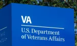 Signage and logo of the U.S. Department of Veterans Affairs - providing healthcare services to military veterans. Fort Wayne - Circa August 2018