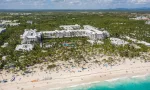 Aerial view from drone on RIU resort building on caribbean beach in Punta Cana^ Bavaro^ Dominican Republic - 8 April 2022
