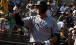 Aaron Judge #99 of the New York Yankees celebrates after hitting a home run against the Oakland Athletics at RingCentral Coliseum. Oakland^ California - August 28^ 2021