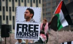 Rally for student activist Mohsen Mahdawi following his arrest by ICE agents across from the ICE Manhattan headquarters. NEW YORK^ NEW YORK USA - April 15^ 2025