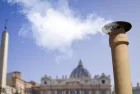 Vatican City - 04-25-2025: White smoke from the chimney on top of the Sistine Chapel. It indicates that the Pope has been elected.
