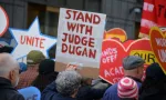 Sign in support of Milwaukee Judge Hannah Dugan at a May Day march for workers' rights in Lower Manhattan. NEW YORK^ NEW YORK USA - May 1^ 2025
