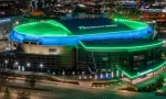 High angle drone view of Paycom Center at night in downtown Oklahoma City. Oklahoma City^ Oklahoma USA - April 14^ 2022
