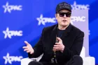 Elon Musk speaks with Newsmax Host Rob Schmitt on day 1 of the 2025 Conservative Political Action Conference. NATIONAL HARBOR^ MD^ USA — February 20 2025