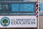 The exterior sign and US flag in front of the U.S. Department of Education offices. Washington^ DC USA; September 5^ 2024: