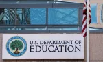 The exterior sign and US flag in front of the U.S. Department of Education offices. Washington^ DC USA; September 5^ 2024: