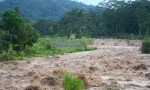 Flash floods that hit the lower plains with water mixed with mud