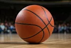 Indoor photo of basketball on the basketball court^ no people^ no brand