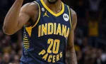 professional male nba basketball indiana pacers player^ screaming^ pointing finger up