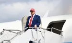 U.S. President Donald Trump arrives at Morristown Airport^ New Jersey^ on June 20^ 2025^ stepping off Air Force One en route to his Bedminster golf resort for a MAGA Inc. fundraising dinner.