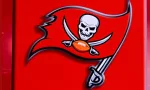 Tampa Bay Buccaneers - Logo of NFL club on red background.