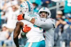 Miami Dolphins cornerbacks Kader Kohou (4) celebrates with Jalen Ramsey (5) after an interception against the Los Angeles Chargers during an NFL football game^ Sept. 10^ 2023^ in Inglewood^ Calif.