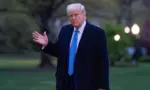 President Donald Trump walks across the south lawn after stepping off Marine 1 Washington DC^ United States^ April 6 2025