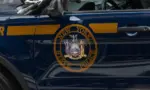New York State Police Car. Emblem on Door of Trooper Car Manhattan^ New York^USA - November 11. 2019