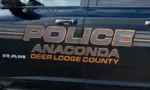 Sign on Anaconda Deer Lodge County police car in closeup. Anaconda^ MT^ USA - May 6^ 2025