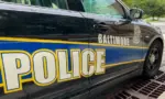 Baltimore Maryland police department sign on police cruiser BALTIMORE^ MARYLAND - JULY 29^ 2023