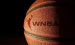 Closeup of a basketball with the WNBA logo and text Raleigh^ NC - USA - 06-13-2024