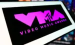 Mobile phone with logo of award show MTV Video Music Awards (VMA) in front of website. Focus on center-left of phone display. Stuttgart^ Germany - 03-19-2024