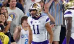 Washington's Jalen McMillan (11) celebrates with teammates after scoring a touchdown against the UCLA during an NCAA college football game Friday^ Sept. 30^ 2022^ in Pasadena^ Calif.