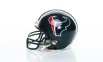 Houston Texans NFL club riddell helmet replica on white background.