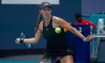 Professional tennis player Jessica Pegula of USA in action during Miami Open 2022 quarter-final match at the Hard Rock Stadium in Miami Gardens^ Florida MIAMI GARDENS^ FLORIDA - MARCH 30^ 2022