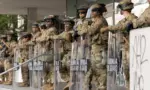 California National Guard soldiers protect a federal building during ICE deportation protests in Downtown LA. Los Angeles^ California^ USA - June 10^ 2025