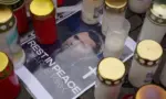 Berlin^ Germany - September 12^ 2025: Makeshift memorial for Charlie Kirk at the Embassy of the United States of America on Pariser Platz in Berlin