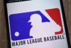 Major League Baseball logo displayed on a modern smartphone KONSKIE^ POLAND - SEPTEMBER 07^ 2018