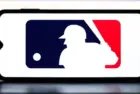 Selective focus of the MLB logo. It is the premier professional baseball league in North America^ featuring top players and teams:
