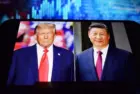 U.S. President Donald Trump and Chinese President Xi Jinping appear on a smartphone screen